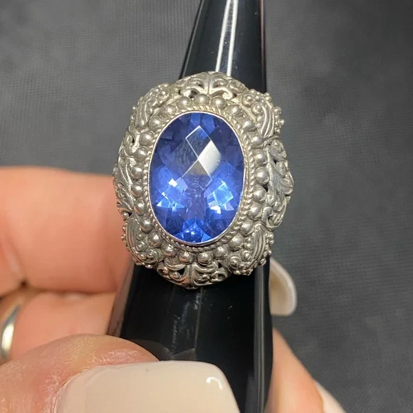 Blue Topaz and Sterling silver .925 ring. 
Size 6
Gorgeous detail. - Picture 4 of 9